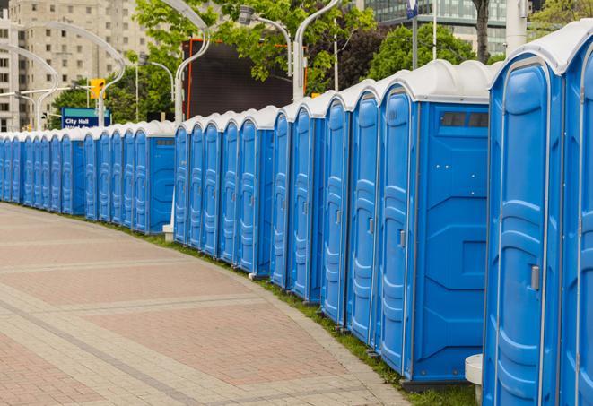 a row of portable restrooms for a special event, ensuring guests have access to clean facilities in Chevy Chase MD